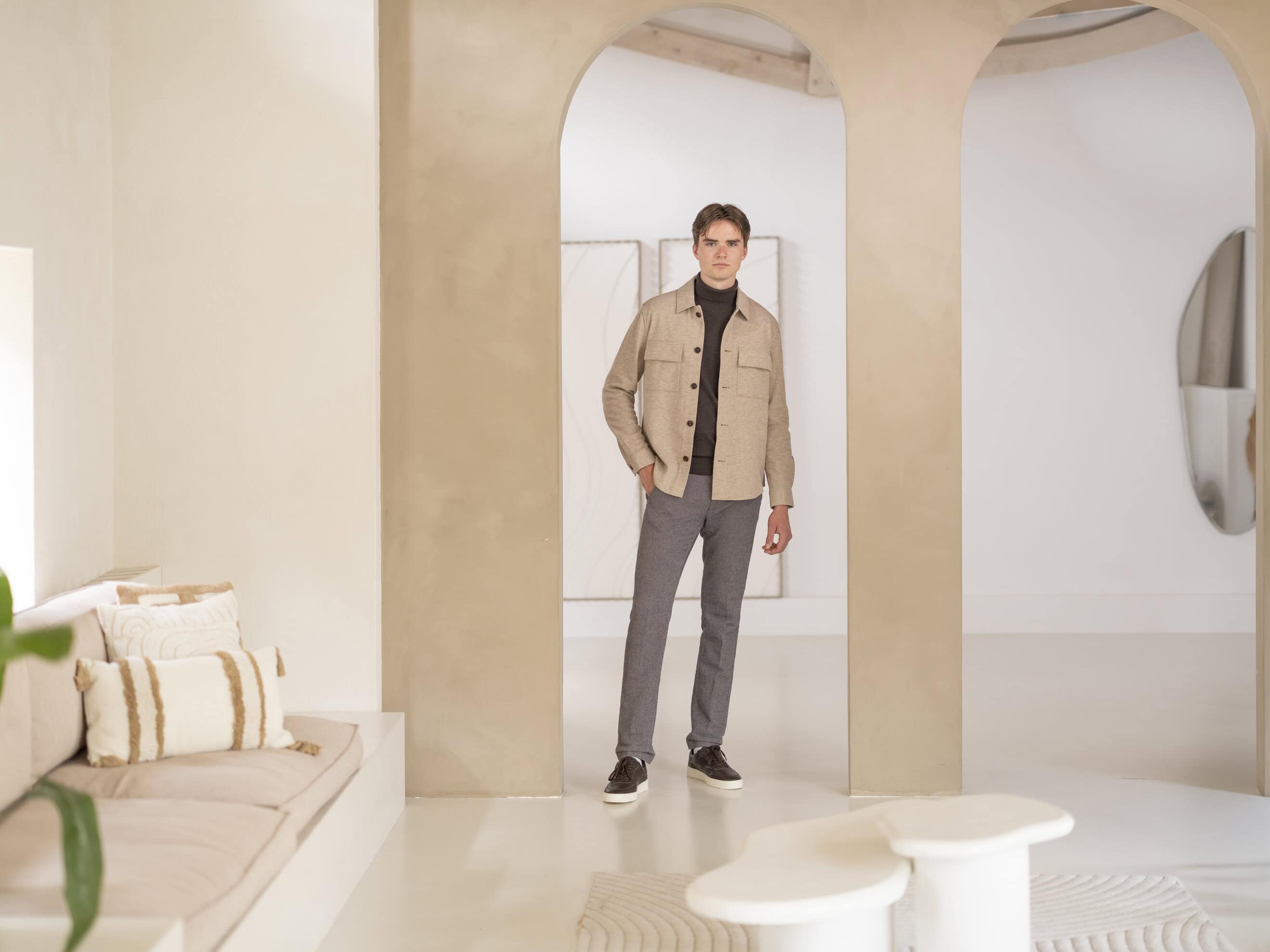 Stylish man in modern interior.
